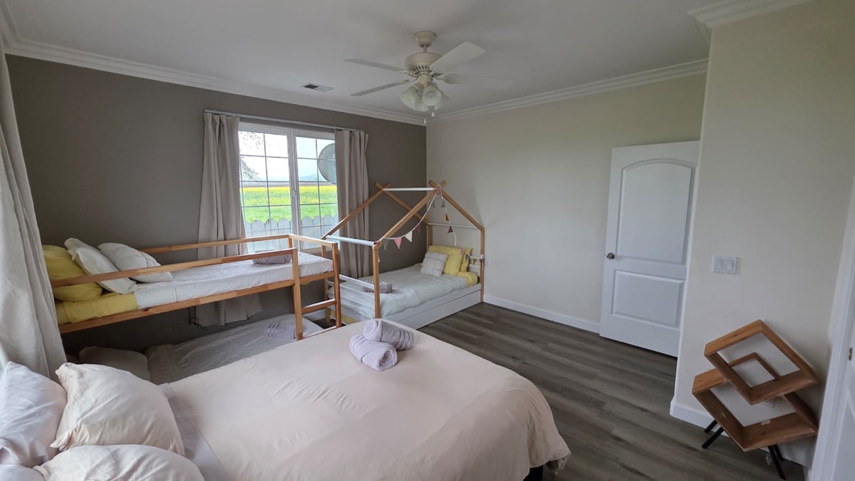 Kids bedroom with bunk and house-frame beds