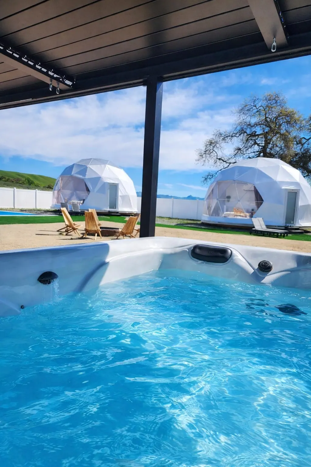 Heated jacuzzi overlooking the domes and hills