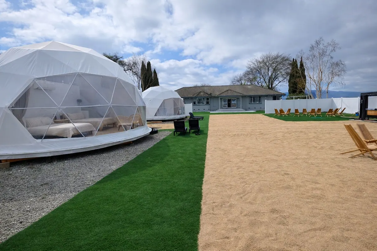 Geodesic domes beside the private house