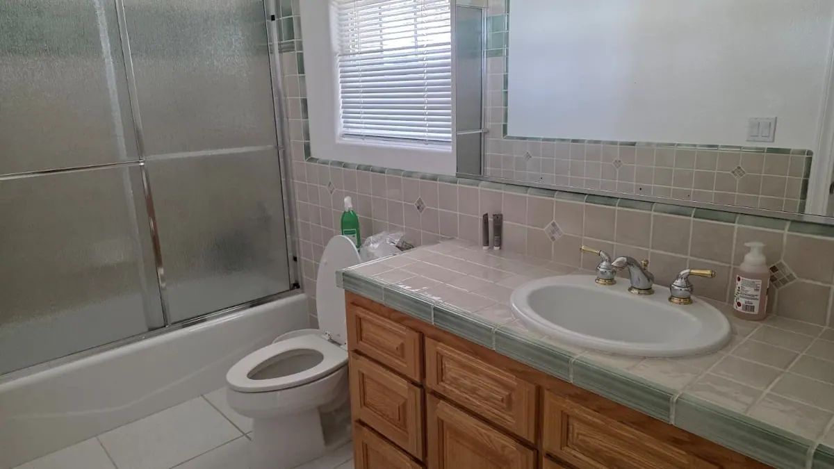 Bathroom with tub and vanity
