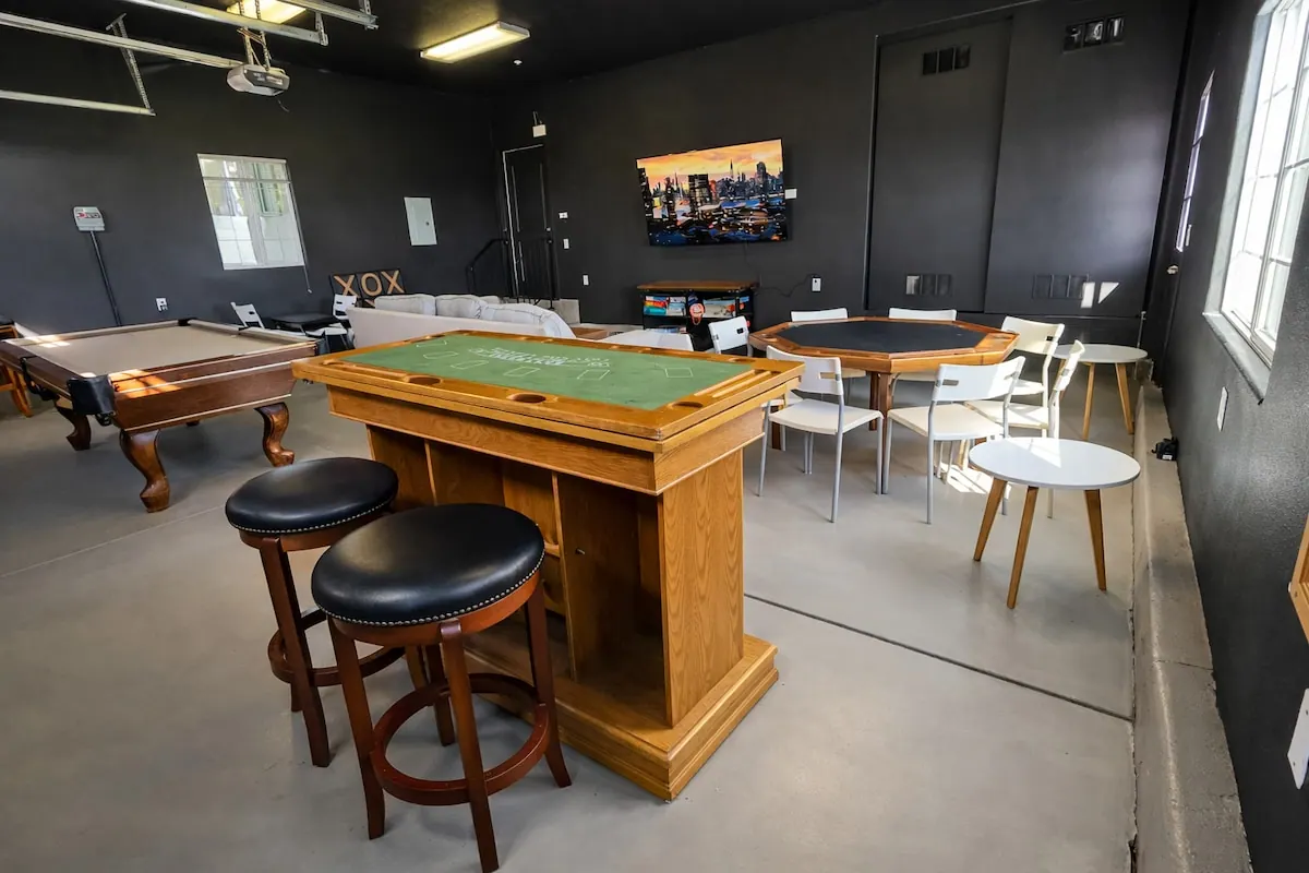 Gaming room with poker and pool tables
