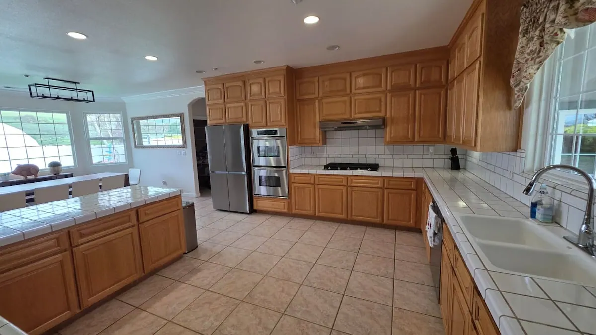 Private house kitchen with island and bar seating